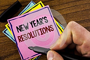 Word writing text New Year'S Resolutions. Business concept for Goals Objectives Targets Decisions for next 365 days written by Ma