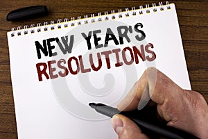 Word writing text New Year'S Resolutions. Business concept for Goals Objectives Targets Decisions for next 365 days written by Ma