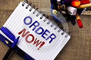 Word writing text Order Now. Business concept for Buy Purchase Order Deal Sale Promotion Shop Product Register written on Notebook