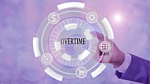 Word writing text Overtime. Business concept for Time or hours worked in addition to regular working hours