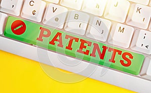 Word writing text Patents. Business concept for government authority or licence conferring a right or title