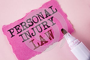 Word writing text Personal Injury Law. Business concept for guarantee your rights in case of hazards or risks written on Tear Pink