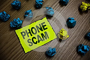Word writing text Phone Scam. Business concept for getting unwanted calls to promote products or service Telesales Yellow piece pa
