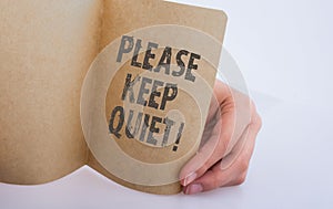 Word writing text Please Keep Quiet on paper