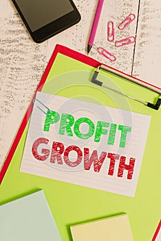 Word writing text Profit Growth. Business concept for Objectives Interrelation of Overall Sales Market Shares Clipboard