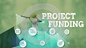 Word writing text Project Funding. Business concept for capital required to undertake a project or programme