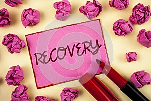 Word writing text Recovery. Business concept for Return to normal state of health Regain possession or control written on Pink Sti