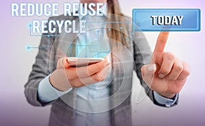 Word writing text Reduce Reuse Recycle. Business concept for environmentallyresponsible consumer behavior Lady front