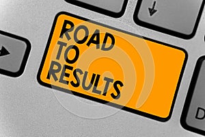 Word writing text Road To Results. Business concept for Business direction Path Result Achievements Goals Progress Keyboard orange