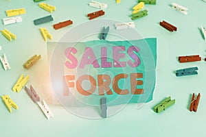 Word writing text Sales Force. Business concept for they are responsible for of selling products or services Colored clothespin