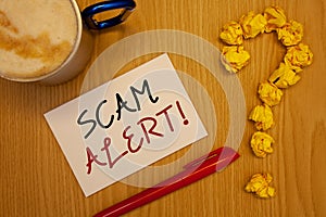 Word writing text Scam Alert Motivational Call. Business concept for Safety warning to avoid fraud or virus attacksIdeas on paper