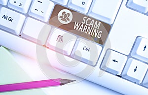 Word writing text Scam Warning. Business concept for caution of unsolicited email claims the prospect of a bargain White