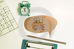 Word writing text Self Care. Business concept for the practice of taking action to improve one s is own health Flat lay