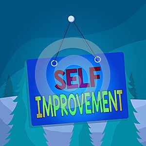 Word writing text Self Improvement. Business concept for process of making yourself a better or more knowledgable Colored memo photo
