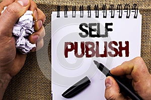 Word writing text Self Publish. Business concept for Publication Write Journalism Manuscript Article Facts written by Man Holding