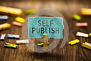 Word writing text Self Publish. Business concept for Published work independently and at own expense Indie Author Clothespin holdi