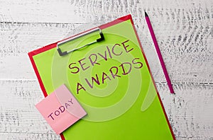 Word writing text Service Awards. Business concept for Recognizing an employee for his or her longevity or tenure Metal