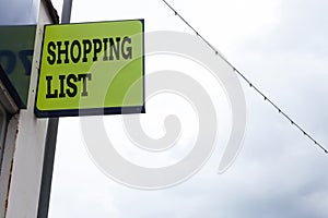 Word writing text Shopping List. Business concept for Discipline approach to shopping Basic Items to Buy Green ad board