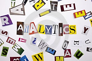 A word writing text showing concept of ANALYTICS made of different magazine newspaper letter for Business case on the white backgr