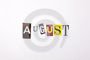 A word writing text showing concept of AUGUST made of different magazine newspaper letter for Business case on the white backgroun