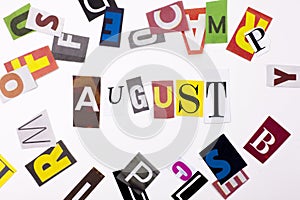 A word writing text showing concept of AUGUST made of different magazine newspaper letter for Business case on the white backgroun