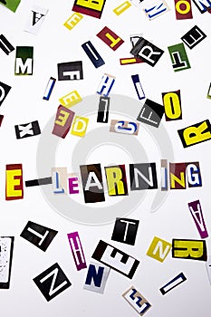 A word writing text showing concept of E-Learning made of different magazine newspaper letter for Business case on the white backg