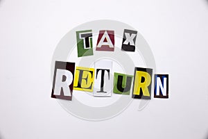 A word writing text showing concept of TAX RETURN made of different magazine newspaper letter for Business case on the white backg