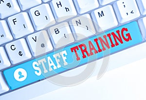 Word writing text Staff Training. Business concept for program that helps employees learn specific knowledge White pc