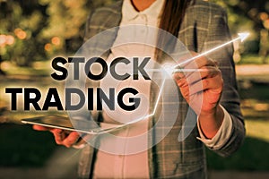 Word writing text Stock Trading. Business concept for Buy and Sell of Securities Electronically on the Exchange Floor.