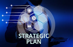 Word writing text Strategic Plan. Business concept for a systematic process of envisioning a desired future Male human