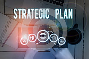 Word writing text Strategic Plan. Business concept for a systematic process of envisioning a desired future Picture