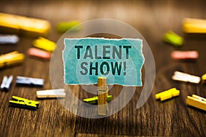 Word writing text Talent Show. Business concept for Competition of entertainers show casting their performances Clothespin holding