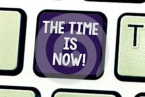 Word writing text The Time Is Now. Business concept for Encouraging someone to start doing today not tomorrow Keyboard