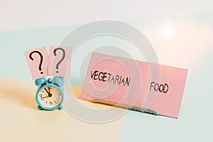 Word writing text Vegetarian Food. Business concept for cuisine refers to food that meets vegetarian standards Mini size alarm