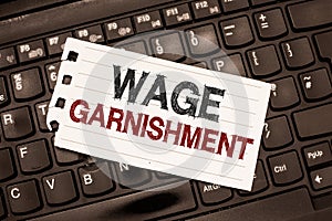 Word writing text Wage Garnishment. Business concept for Deducting money from compensation ordered by the court
