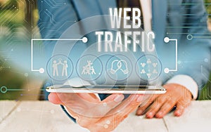 Word writing text Web Traffic. Business concept for Amount of data sent and received by visitors to a website Male human