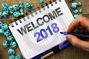 Word writing text Welcome 2018. Business concept for Celebration New Celebrate Future Wishes Gratifying Wish written by Man Holdin