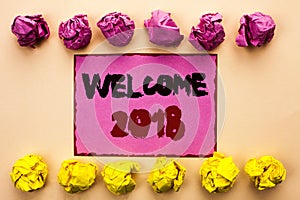 Word writing text Welcome 2018. Business concept for Celebration New Celebrate Future Wishes Gratifying Wish written on Pink Stick