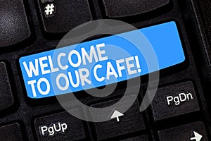 Word writing text Welcome To Our Cafe. Business concept for Greeting receiving showing in restaurant good attention