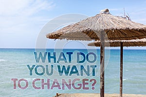 Word writing text What Do You Want To Change Question. Business concept for Strategy Planning Decision Objective Blue beach water