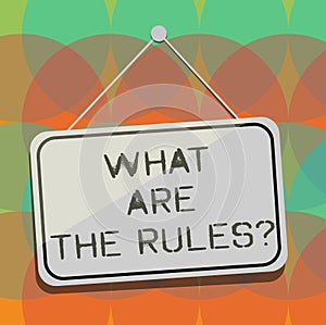 Word writing text What Are The Rulesquestion. Business concept for Set up the regulations before starting anything Blank Hanging