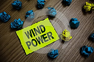 Word writing text Wind Power. Business concept for use of air flowto provide mechanical power to turn generators Yellow piece pape