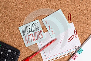 Word writing text Wireless Network. Business concept for computer network that uses wireless data connections Desk notebook paper