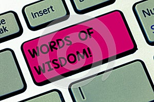 Word writing text Words Of Wisdom. Business concept for Expert advices orientation from somebody with knowledge Keyboard
