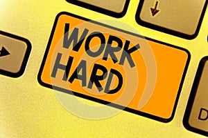 Word writing text Work Hard. Business concept for Laboring that puts effort into doing and completing tasks Keyboard yellow key In