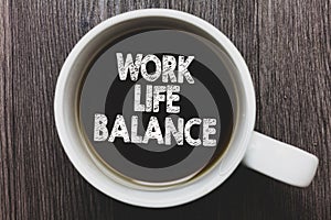 Word writing text Work Life Balance. Business concept for Division of time between working or family and leisure Black coffee with