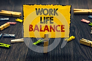 Word writing text Work Life Balance. Business concept for Division of time between working or family and leisure Blacky wooden des