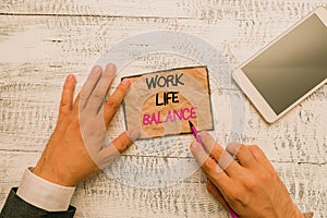 Word writing text Work Life Balance. Business concept for Division of time between working or family and leisure Hand