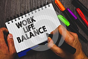 Word writing text Work Life Balance. Business concept for Division of time between working or family and leisure Hand holding pen