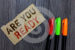 Word writing text Are You Ready. Business concept for Alertness Preparedness Urgency Game Start Hurry Wide awake Paperboard Import